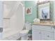 Clean bathroom with tub/shower combo and granite vanity at 2805 N Ocean Blvd. # 301, Myrtle Beach, SC 29577