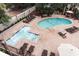 Community pool and hot tub with lounge chairs for relaxation at 2805 N Ocean Blvd. # 301, Myrtle Beach, SC 29577