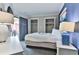 Cozy bedroom with a queen bed and ocean view at 2805 N Ocean Blvd. # 301, Myrtle Beach, SC 29577