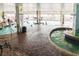 Indoor pool and hot tub with whimsical cartoon theming at 2805 N Ocean Blvd. # 301, Myrtle Beach, SC 29577
