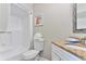 Clean bathroom with shower/tub combo, granite vanity, and white toilet at 2805 N Ocean Blvd. # 301, Myrtle Beach, SC 29577