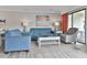 Bright living room with comfy sofas, coffee table, and ocean view at 2805 N Ocean Blvd. # 301, Myrtle Beach, SC 29577