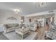 Bright and airy living room with comfortable seating and access to kitchen at 5310 N Ocean Blvd. # 301, Myrtle Beach, SC 29577