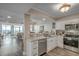 Modern kitchen with granite countertops, stainless steel appliances, and an island at 5310 N Ocean Blvd. # 301, Myrtle Beach, SC 29577