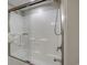 Bathroom with tub and sliding glass shower doors at 5310 N Ocean Blvd. # 301, Myrtle Beach, SC 29577