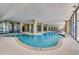 Indoor pool and hot tubs with large windows at 5310 N Ocean Blvd. # 301, Myrtle Beach, SC 29577