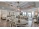 Bright dining area with a glass-top table and chairs, offering an open view at 5310 N Ocean Blvd. # 301, Myrtle Beach, SC 29577