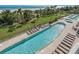 Relaxing resort-style pool with plenty of lounge chairs for sunbathing at 5310 N Ocean Blvd. # 301, Myrtle Beach, SC 29577