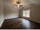 Bright bedroom with wood-look floors and a ceiling fan at 1033 Sioux Swamp Dr., Conway, SC 29527