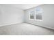 Bright bedroom with carpet and double window at 3083 Dover Branch Dr., Little River, SC 29566