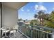 Balcony with partial ocean view and two chairs at 1105 S Ocean Blvd. # 228, Myrtle Beach, SC 29577