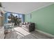 Living room with sleeper sofa, ocean view, and dining area at 1105 S Ocean Blvd. # 228, Myrtle Beach, SC 29577