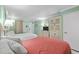Bedroom with two beds, dresser, and coastal decor at 1105 S Ocean Blvd. # 228, Myrtle Beach, SC 29577
