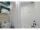 Clean bathroom with shower/tub combo and white tile at 1105 S Ocean Blvd. # 228, Myrtle Beach, SC 29577