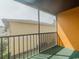 Screened balcony overlooking a courtyard and neighboring building at 1301 Pridgen Rd. # 105, Myrtle Beach, SC 29577