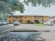 Two-story building with multiple units and parking at 1301 Pridgen Rd. # 105, Myrtle Beach, SC 29577