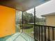 Spacious screened balcony with treetop and neighborhood views at 1301 Pridgen Rd. # 105, Myrtle Beach, SC 29577