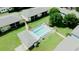 Community pool with surrounding lounge chairs and landscaping at 1301 Pridgen Rd. # 105, Myrtle Beach, SC 29577