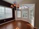 Bright dining room with bay window and hardwood floors at 709 Ashley Manor Dr., Longs, SC 29568