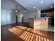 Sunlit living room features hardwood floors and high ceilings at 709 Ashley Manor Dr., Longs, SC 29568