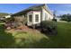 Side view of the house exterior, featuring a bay window and landscaping at 709 Ashley Manor Dr., Longs, SC 29568