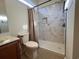 Updated bathroom with a large tiled shower and modern vanity at 709 Ashley Manor Dr., Longs, SC 29568