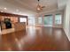 Open floor plan with hardwood floors, a spacious kitchen, and breakfast bar at 709 Ashley Manor Dr., Longs, SC 29568