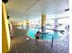Indoor/outdoor heated pool area with multiple hot tubs and seating at 2000 N Ocean Blvd. # 503, Myrtle Beach, SC 29577