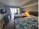 Bedroom with two beds and ocean view at 2000 N Ocean Blvd. # 503, Myrtle Beach, SC 29577