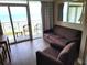Living room with ocean view balcony and comfortable seating at 2000 N Ocean Blvd. # 503, Myrtle Beach, SC 29577
