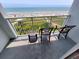 Balcony with ocean view and chairs at 2000 N Ocean Blvd. # 503, Myrtle Beach, SC 29577
