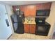 Small galley kitchen with granite countertop at 2000 N Ocean Blvd. # 503, Myrtle Beach, SC 29577