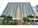 Tall yellow building with many balconies and ocean views at 2000 N Ocean Blvd. # 503, Myrtle Beach, SC 29577