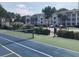 Tennis court with apartment buildings in the background at 517 White River Dr. # 22H, Myrtle Beach, SC 29579