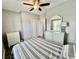 Well-lit bedroom featuring a comfortable bed and built-in dresser at 801 Crumpet Ct. # 1135, Myrtle Beach, SC 29579