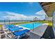 Inviting pool with blue lounge chairs, overlooking the ocean at 1919 South Waccamaw Dr., Garden City Beach, SC 29576