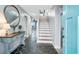 Bright entryway with stone floors and elegant console table at 1919 South Waccamaw Dr., Garden City Beach, SC 29576