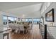 Spacious dining room with ocean views and large windows at 1919 South Waccamaw Dr., Garden City Beach, SC 29576
