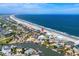 Aerial view of beachfront home and neighborhood at 1919 South Waccamaw Dr., Garden City Beach, SC 29576