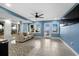 Basement recreation area with sofa and ocean views at 1919 South Waccamaw Dr., Garden City Beach, SC 29576