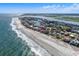 Stunning aerial view showcasing the property's beachfront location at 1919 South Waccamaw Dr., Garden City Beach, SC 29576