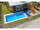 Aerial view of a house with a pool and deck; perfect for outdoor entertaining at 1919 South Waccamaw Dr., Garden City Beach, SC 29576