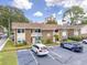 Brick building with parking and ocean views in the background at 7602 Porcher Dr. # C, Myrtle Beach, SC 29572