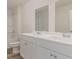 Modern bathroom with double vanity and shower at 170 Calm Dr., Little River, SC 29566