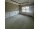 Formal dining room with wainscoting and large window at 2260 Pearl Rd., Galivants Ferry, SC 29544