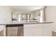 Modern kitchen island with granite countertops and stainless steel dishwasher at 314 Acosta Circle, Conway, SC 29527