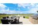 Outdoor patio with built-in grill and pond view at 1958 Woodrush Loop, Little River, SC 29566
