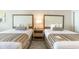 Two twin beds with matching bedding in a hotel room at 1105 S Ocean Blvd. # 1040, Myrtle Beach, SC 29577