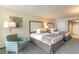 Bedroom with two twin beds and an armchair at 1105 S Ocean Blvd. # 1040, Myrtle Beach, SC 29577