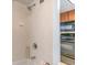 Small tub and shower combination in a hotel bathroom at 1105 S Ocean Blvd. # 1040, Myrtle Beach, SC 29577